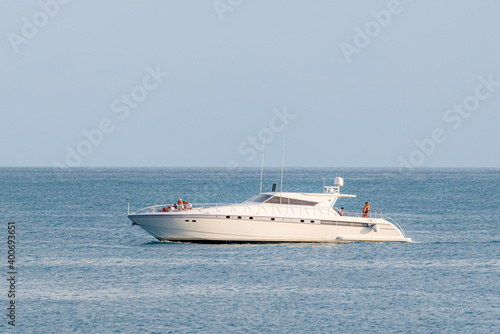 Speed boat cruising in the sea. Young people relaxing in a sea