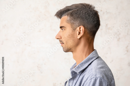 Man with graying hair on li...