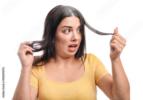 Valokuva Stressed woman with graying hair on white background