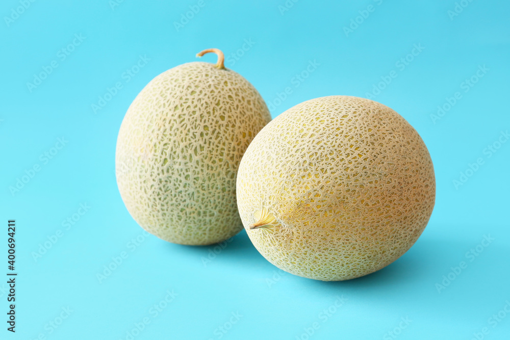 Sweet ripe melons on color background Sweet ripe melons on color background
