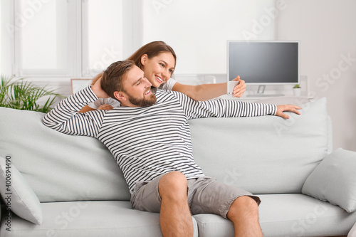 Young couple taking selfie ...