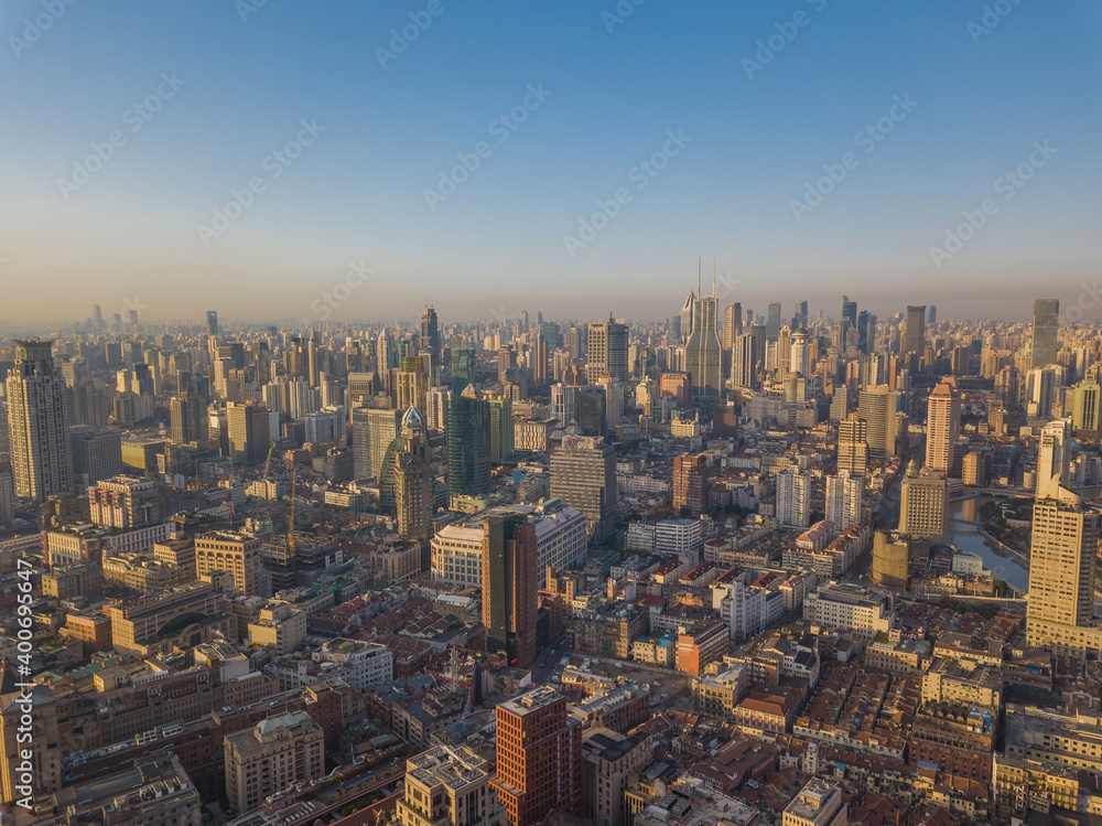 Aerial view of the skyline in Puxi, Shanghai, at sunrise.