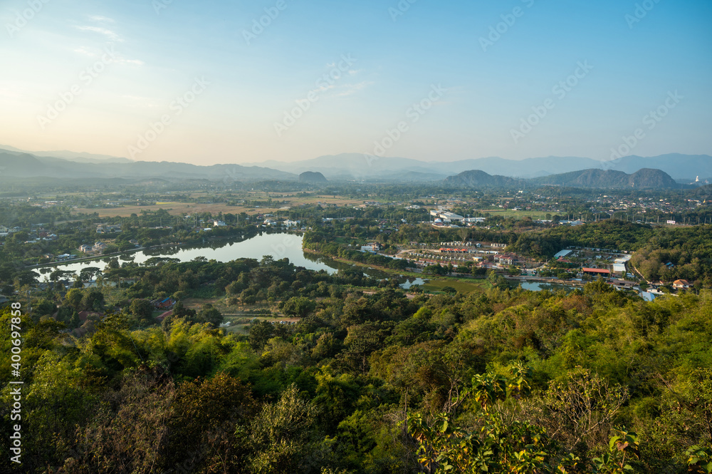 Top view of the suburb of Chiang Rai city from Wat Phra That Doi Khao Kwai the best spot for see panoramic view of Chiang Rai cityscape.