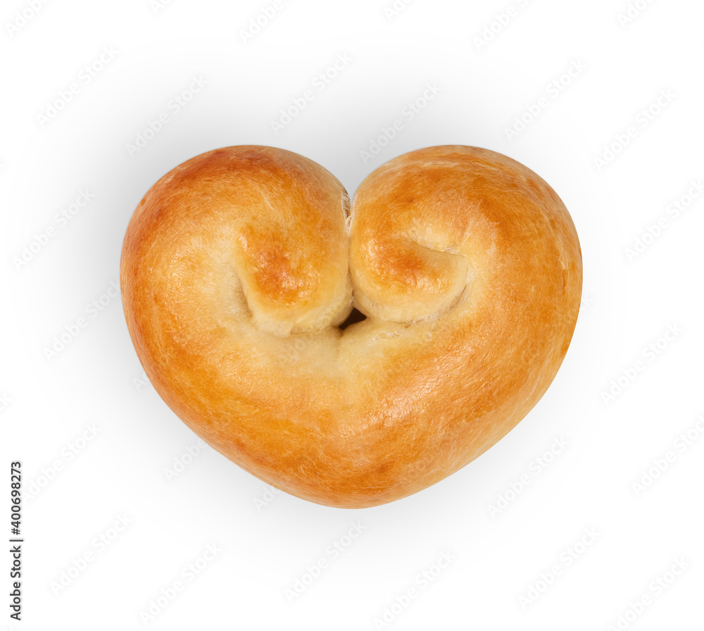 Romantic bread heart. Yeast bread bun in heart shape with egg wash. Concept for valentines day or baking with love. Traditional Swiss butter bread called Zopf or Challah. Isolated on white. Romantic bread heart. Yeast bread bun in heart shape with egg wash. Concept for valentines day or baking with love. Traditional Swiss butter bread called Zopf or Challah. Isolated on white.