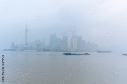 The bund in Shanghai, on a thick foggy day.