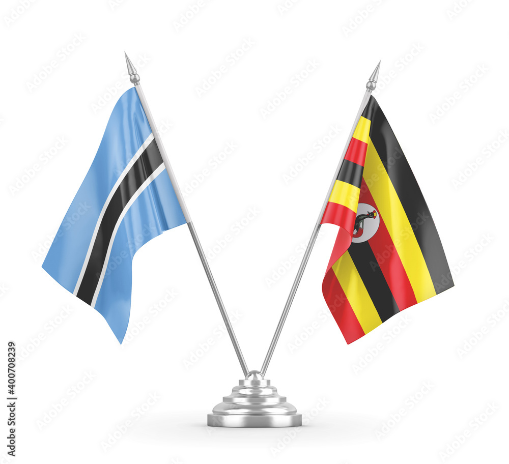Uganda and Botswana table flags isolated on white 3D rendering 
