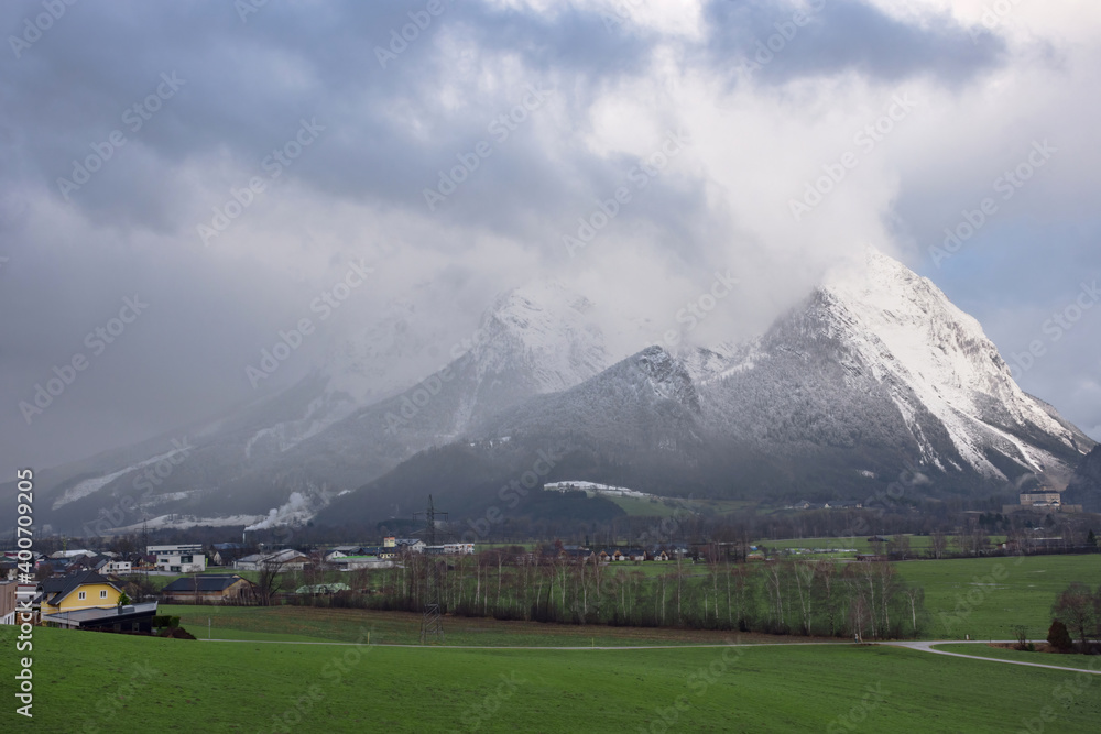 Fototapeta premium Winter landscape with snow covered Grimming mountain in Ennstal, Steiermark, Austria
