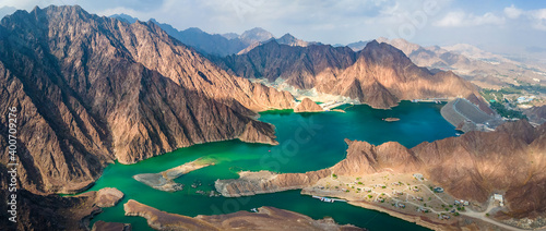 Hatta Dam Lake in eastern region of Dubai, United Arab Emirates aerial panorama photo
