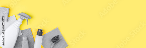 Banner made from grey house cleaning products are on yellow background.