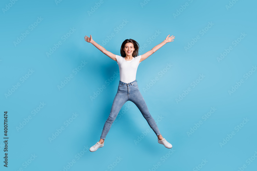 Full size photo of happy woman jump up star shape weekend sale isolated on blue color background