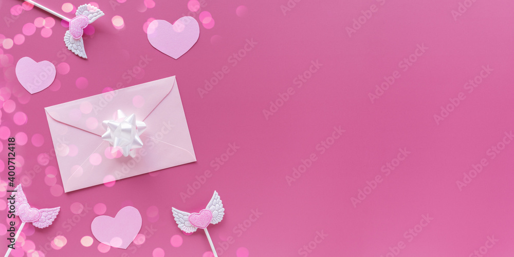Pink hearts, toppers, envelope with letter on pink background. Romantic, Valentines concept. Valentine's day banner. Flat lay, top view, copy space.