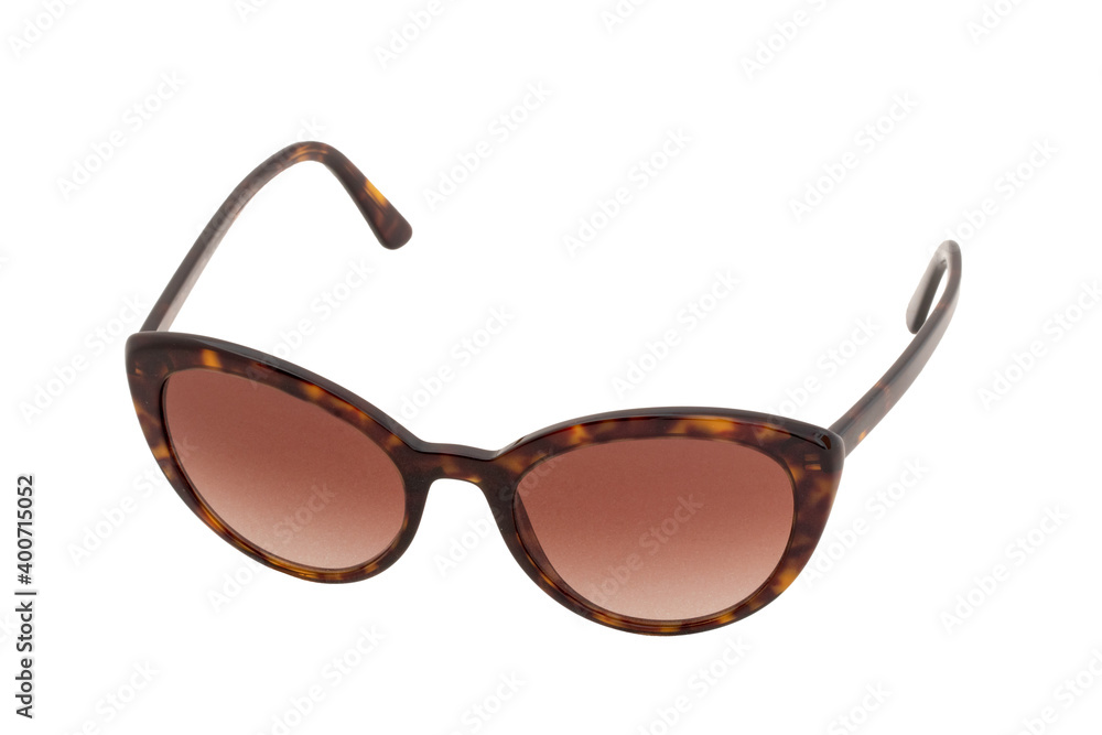 Summer glasses fashion. Close-up of a elegant luxury female sunglasses with fancy yellow pattern isolated on a white background. Macro photograph. Summer glasses fashion. Close-up of a elegant luxury female sunglasses with fancy yellow pattern isolated on a white background. Macro photograph.