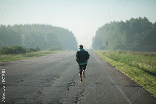 The guy is on the road in the morning.
