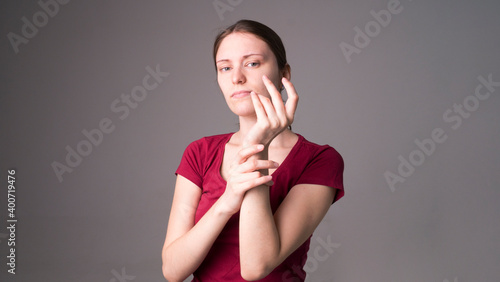 Parkinson's disease symptoms. Close up of tremor (shaking) hands of Middle-aged women patient with Parkinson's disease. Mental health and neurological disorders.