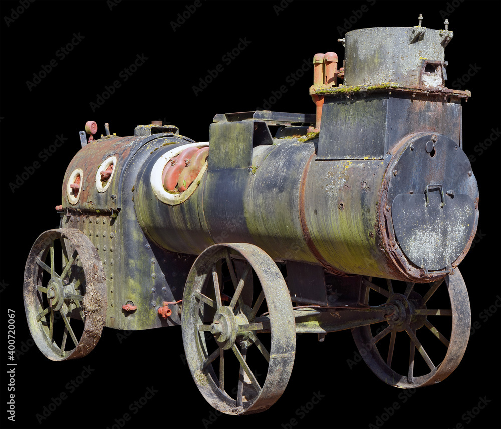 An ancient steam locomotive used in agriculture a hundred years ago isolated