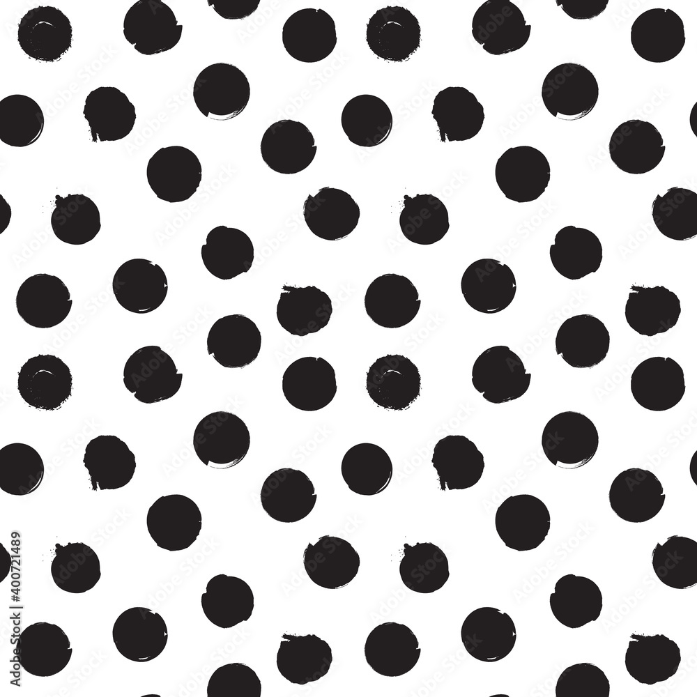 Vector seamless pattern with grunge black dots. Random situated circles. Endless trendy background in black and white colors. Best for wrapping paper, textile, home decor. Vector seamless pattern with grunge black dots. Random situated circles. Endless trendy background in black and white colors. Best for wrapping paper, textile, home decor.