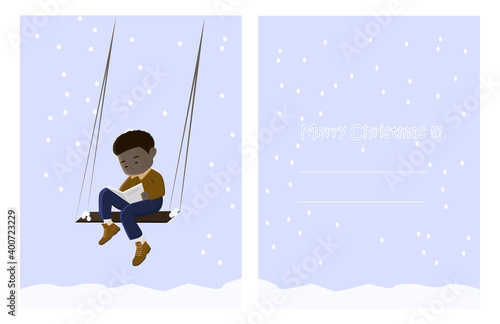 postcard with a young guy reads a book in a winter evening on a swing, card for a distant friend 