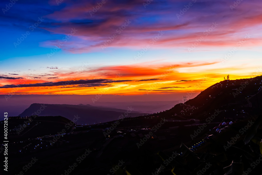 Fototapeta premium Twilight sky of mountain Phu Tub Berk, famous travel location beautiful sea fog at Thailand.