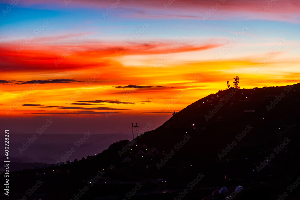 Fototapeta premium Twilight sky of mountain Phu Tub Berk, famous travel location beautiful sea fog at Thailand.