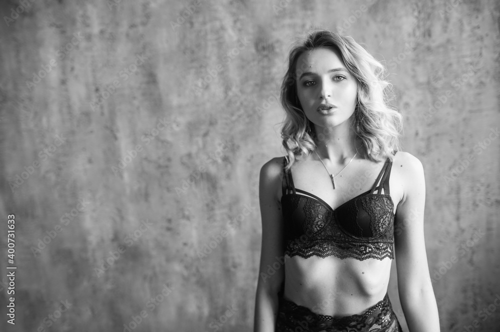Perfect young woman in sexy black lingerie