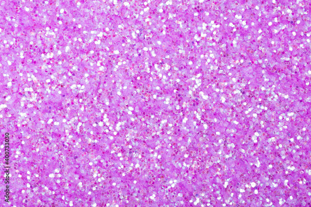 Light holographic glitter background, your new Christmas texture in lilac color for design.