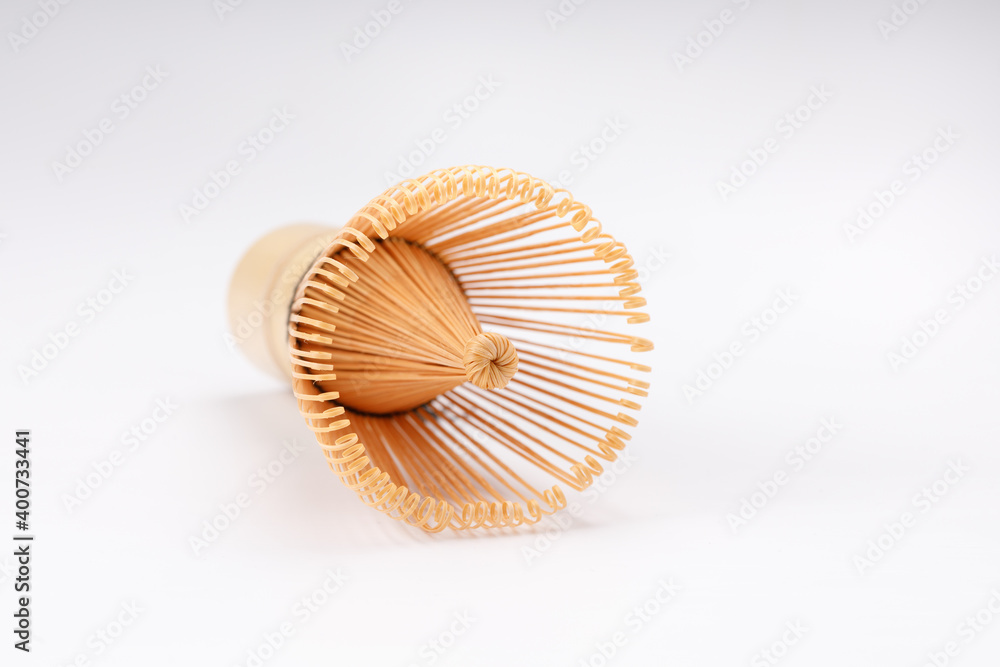 Bamboo Brush Tea Whisk Called matcha on White Background. Close-up. Bamboo Brush Tea Whisk Called matcha on White Background. Close-up.