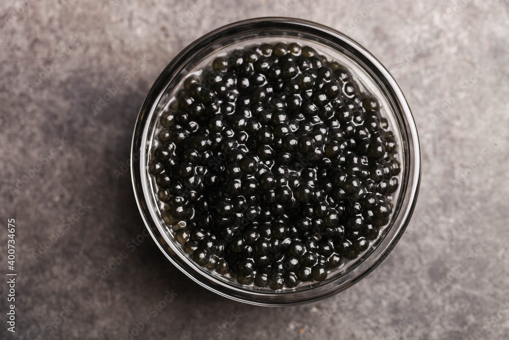 Black sturgeon caviar in a glass bowl Black sturgeon caviar in a glass bowl
