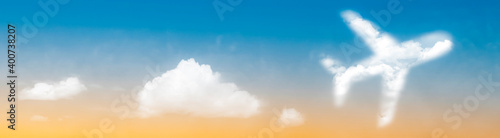 Plane symbol in clouds at sunset concept for tropical holiday panoramic