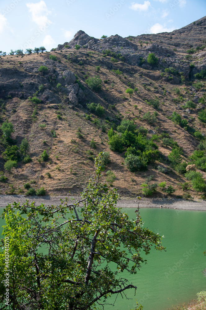 View of a mountain lake in the Crimea in summer View of a mountain lake in the Crimea in summer