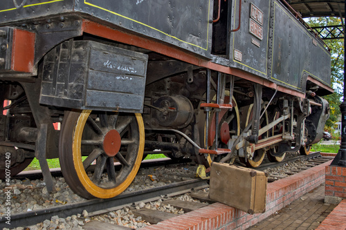 Old steam locomotive on a pedestal