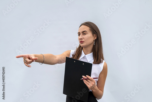 cheerful business woman with clipboard, isolated on white background