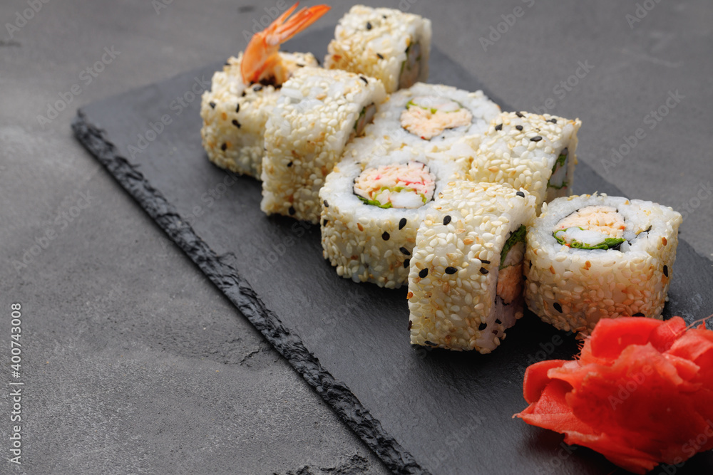 Japanese sushi roll on plate close up Japanese sushi roll on plate close up