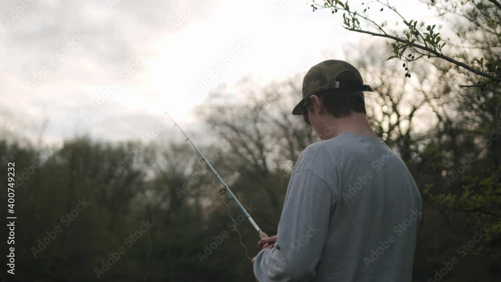 Evening shots of a young man fishing in a small pond. Shot in the mid summer with the Pocket 6K. Mix of wide and tight shots. Evening shots of a young man fishing in a small pond. Shot in the mid summer with the Pocket 6K. Mix of wide and tight shots.