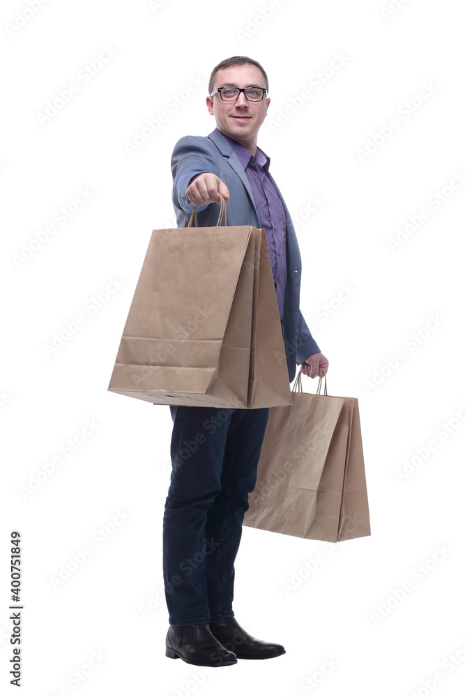 Picture of handsome smiling man in suit with shopping bags Picture of handsome smiling man in suit with shopping bags