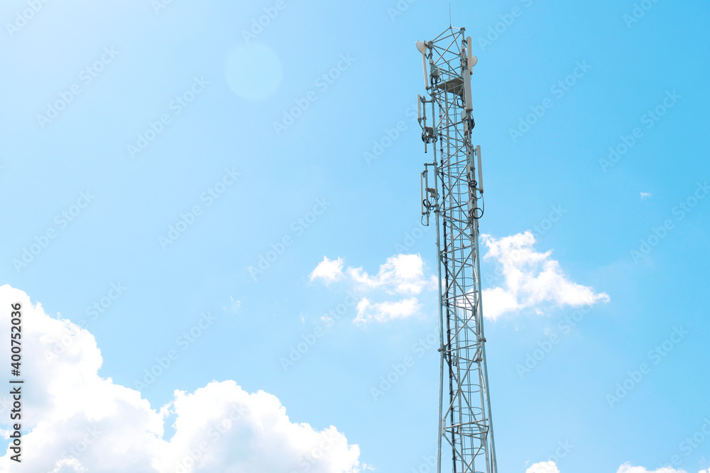 communication tower against a blue sky