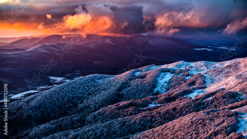 An unique sunset over the Wielka Rawka seen from the Mount Tanica. Bieszczady National Park. Carpathian Mountains. Poland photo