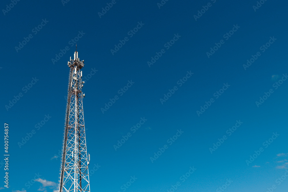 communication tower against a blue sky communication tower against a blue sky
