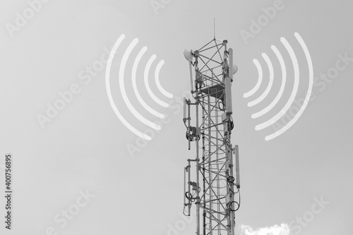 concept of the negative impact of new 5g technology on humans. gray cellular base station