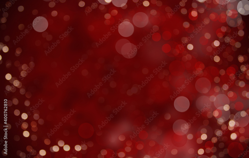 Festive bokeh on a red background. Merry christmas and Happy New Year. Background for the design. Festive bokeh on a red background. Merry christmas and Happy New Year. Background for the design.