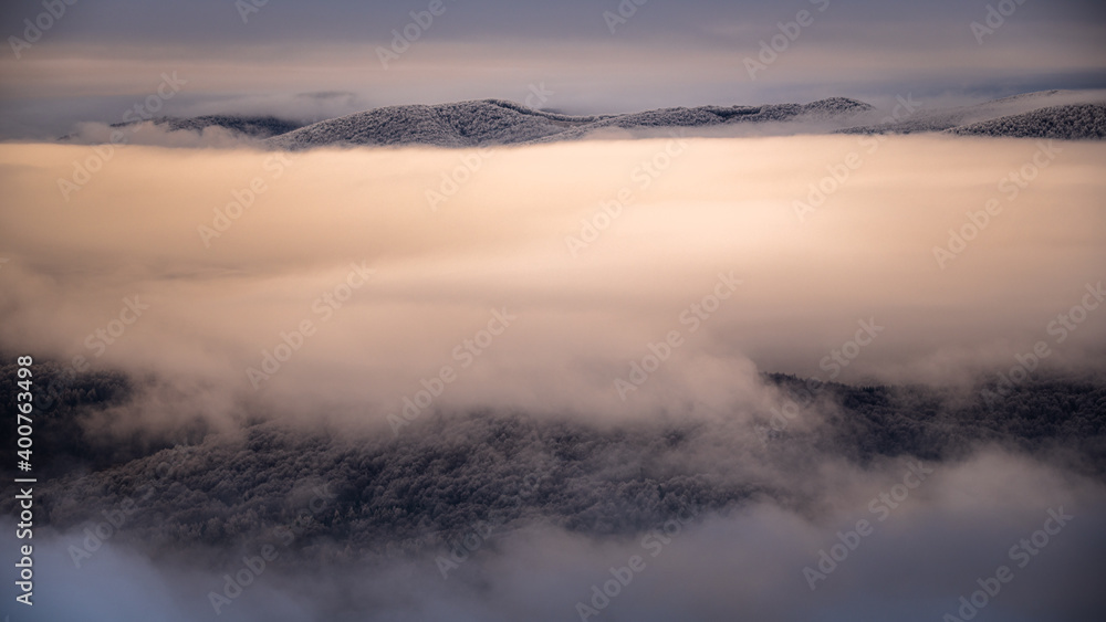 Mountain peaks over the clouds. An unigue vista. Bieszczady National Park. Carpathians. Poland.