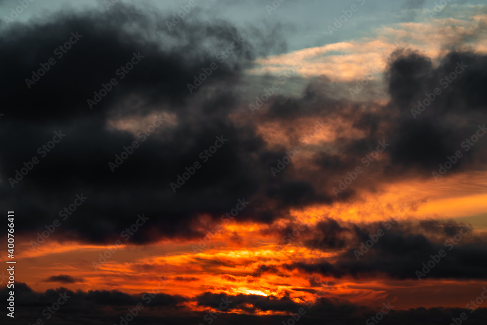 Beautiful fiery dawn sky background