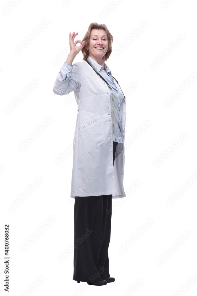A full-length portrait of a middle age mature doctor woman wearing stethoscope A full-length portrait of a middle age mature doctor woman wearing stethoscope