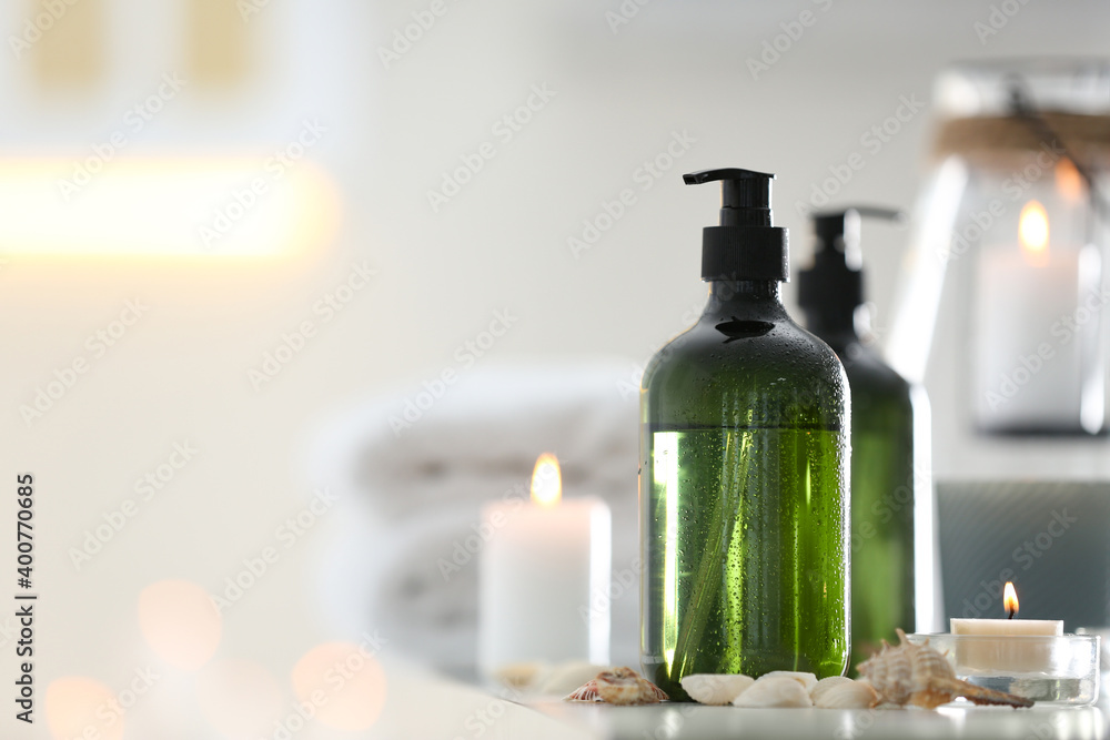 Soap dispensers and decor elements on table. Space for text Soap dispensers and decor elements on table. Space for text