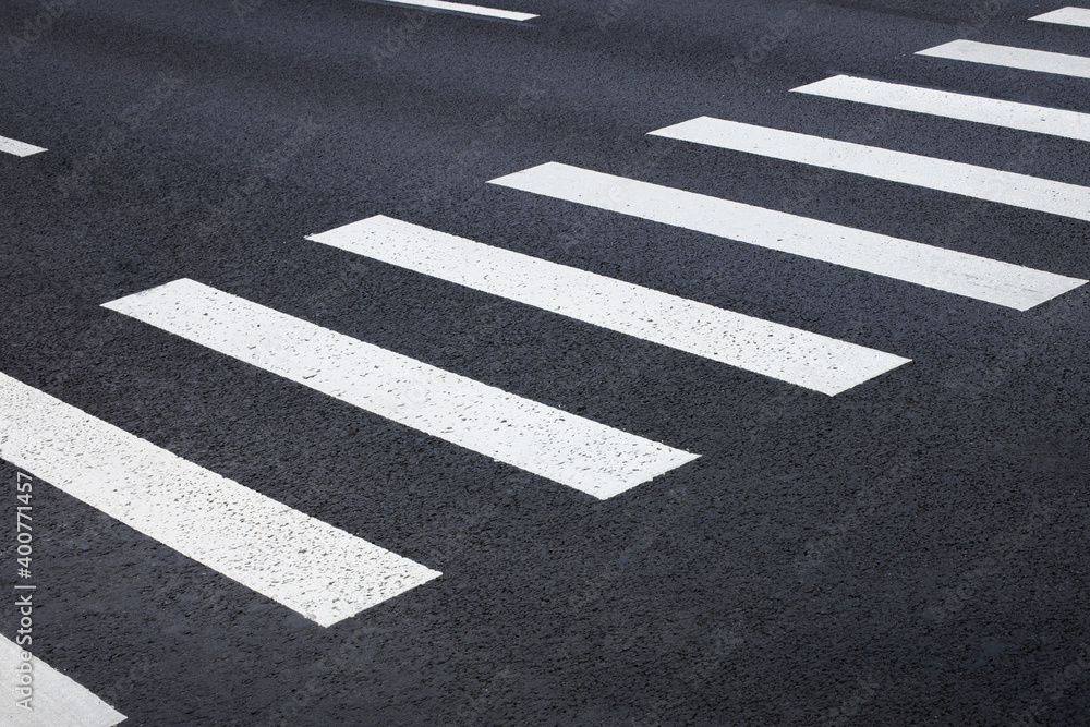 pedestrian crossing, white stripes on black asphalt, road markings