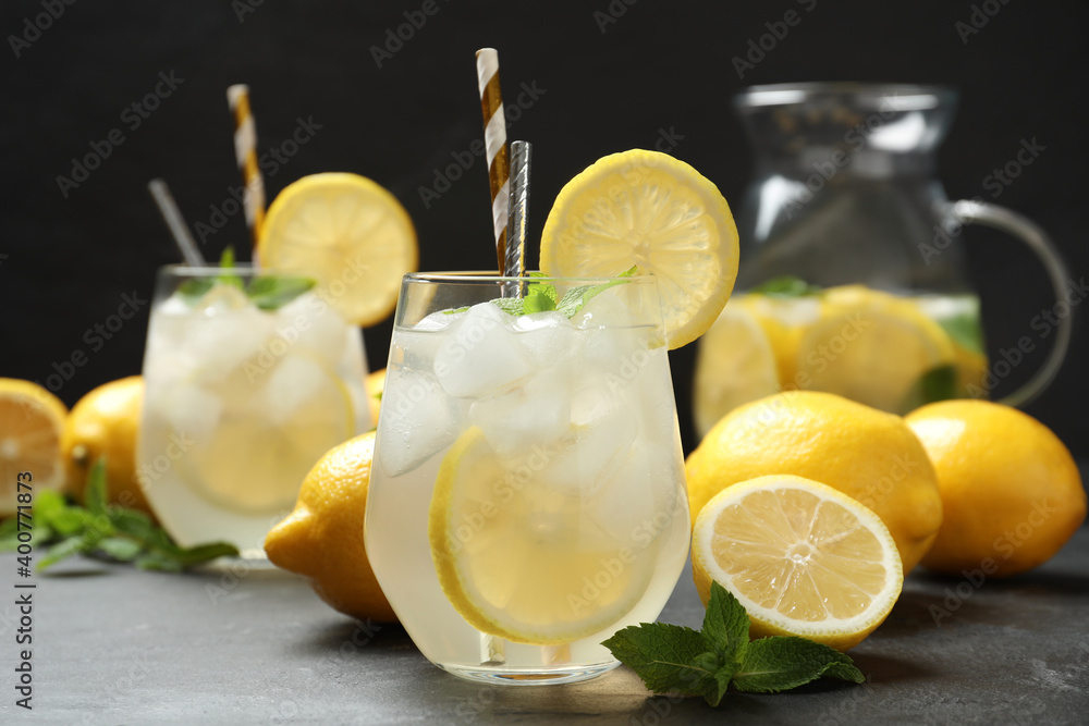 Fototapeta premium Natural lemonade with mint on grey table. Summer refreshing drink