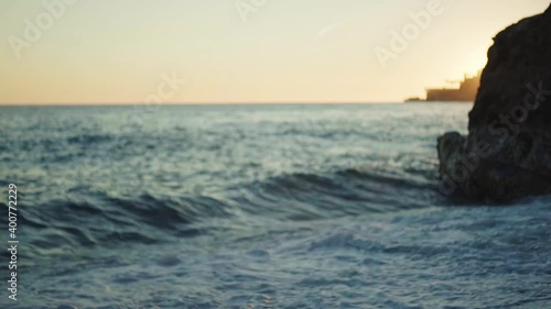 young spanish woman doing sport at the beach in the mediterranean sea