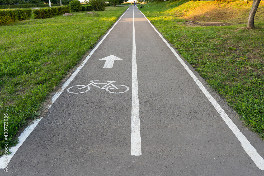 bike lane sign on the asphalt. Bike path