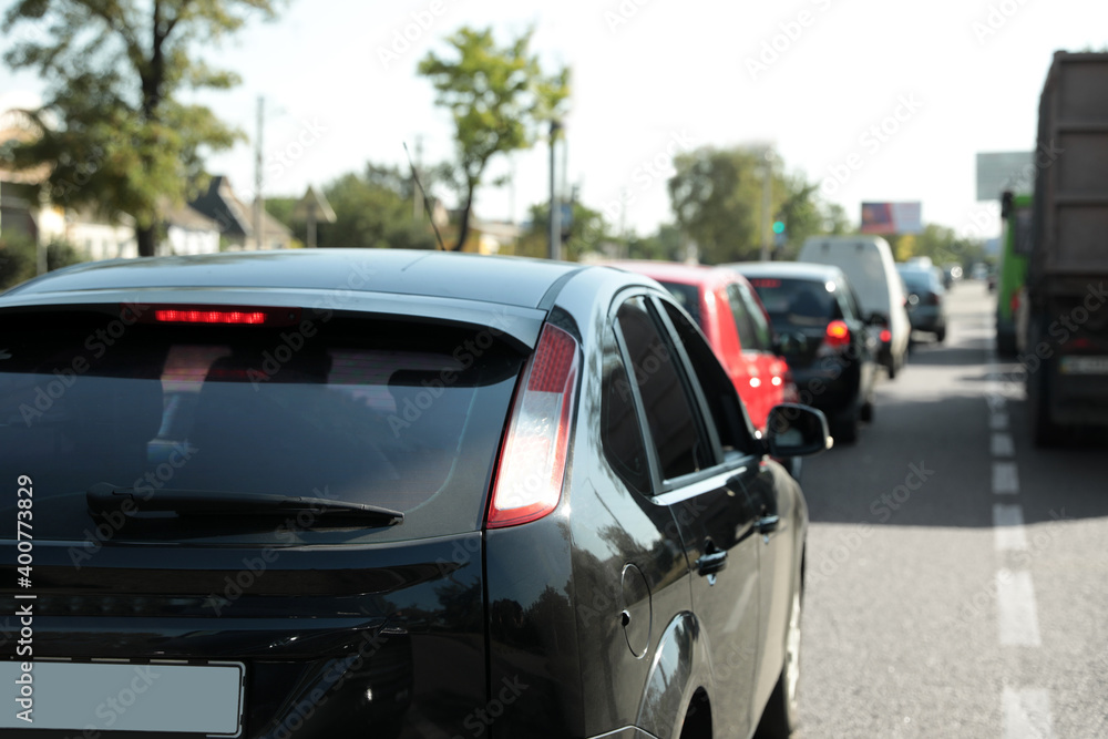 Cars in traffic jam on city street