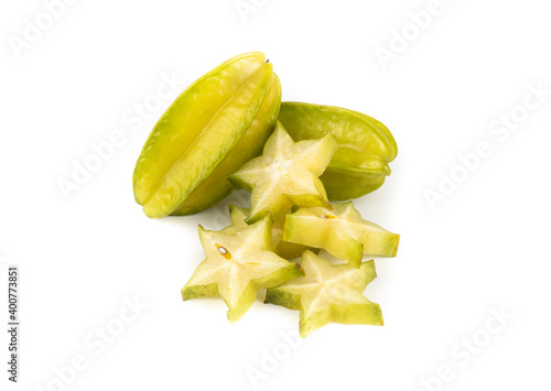 A group of starfruits and slices isolated over white background