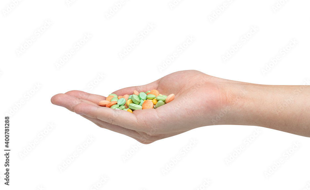 Hand holding pill isolated on white background ,include clipping path Hand holding pill isolated on white background ,include clipping path